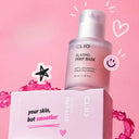 CLIO Glazing Prep Base bottle displayed on its box against a pink background, surrounded by playful doodles and accents, highlighting a smooth, glowing K-beauty makeup base product.