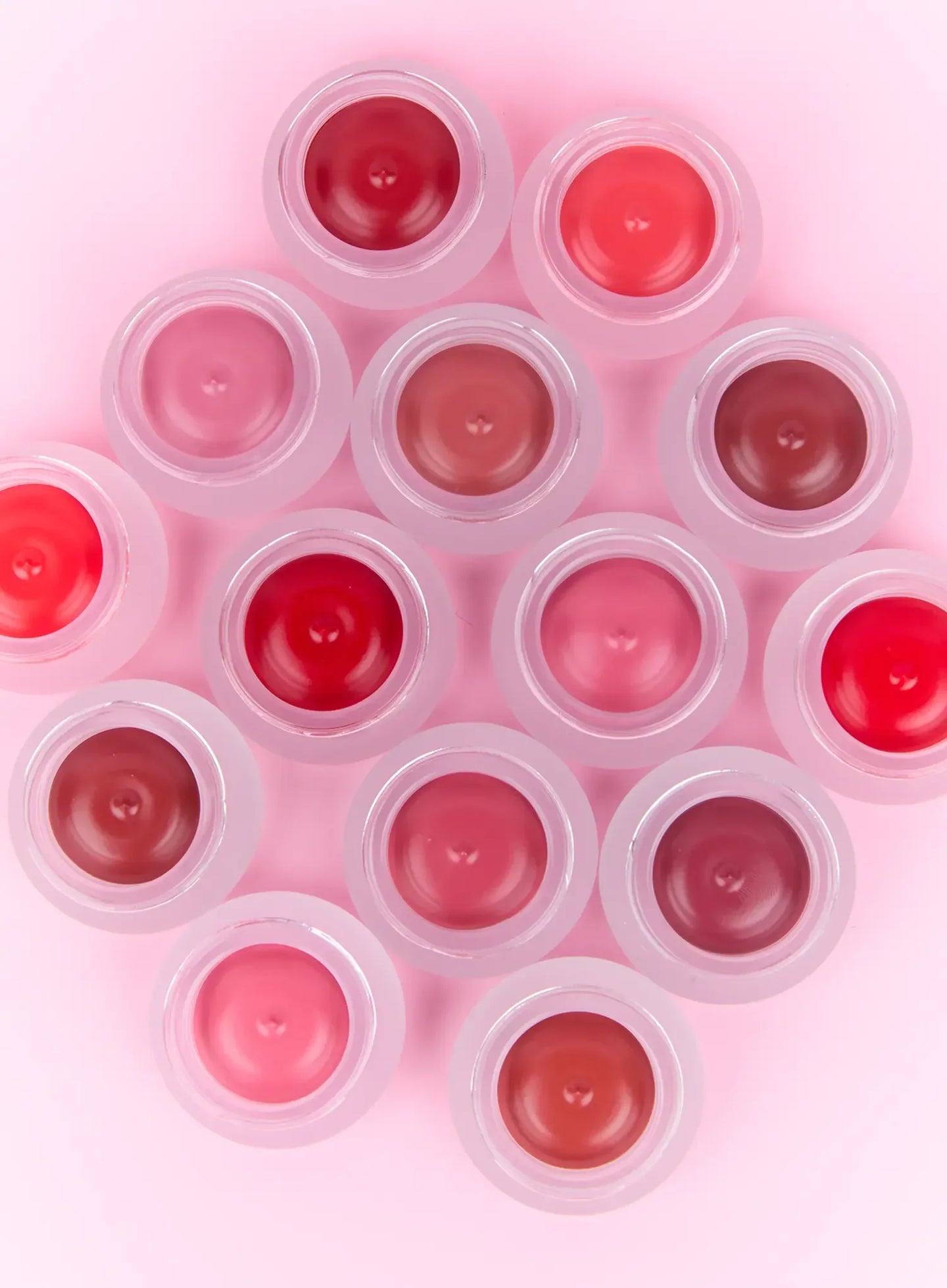 Soft-blur lip and cheek pudding pot blended onto cheek for one-tone flushed K-beauty pastel face wash