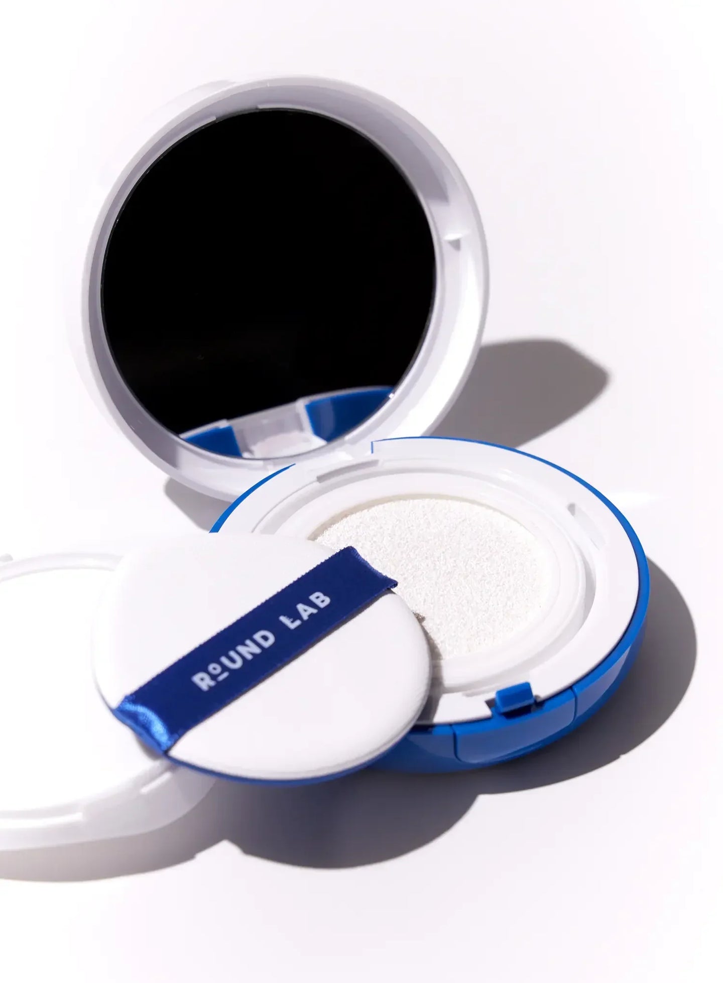 Korean birch sun cushion compact open with sponge for derm-validated sensitive-skin sun protection