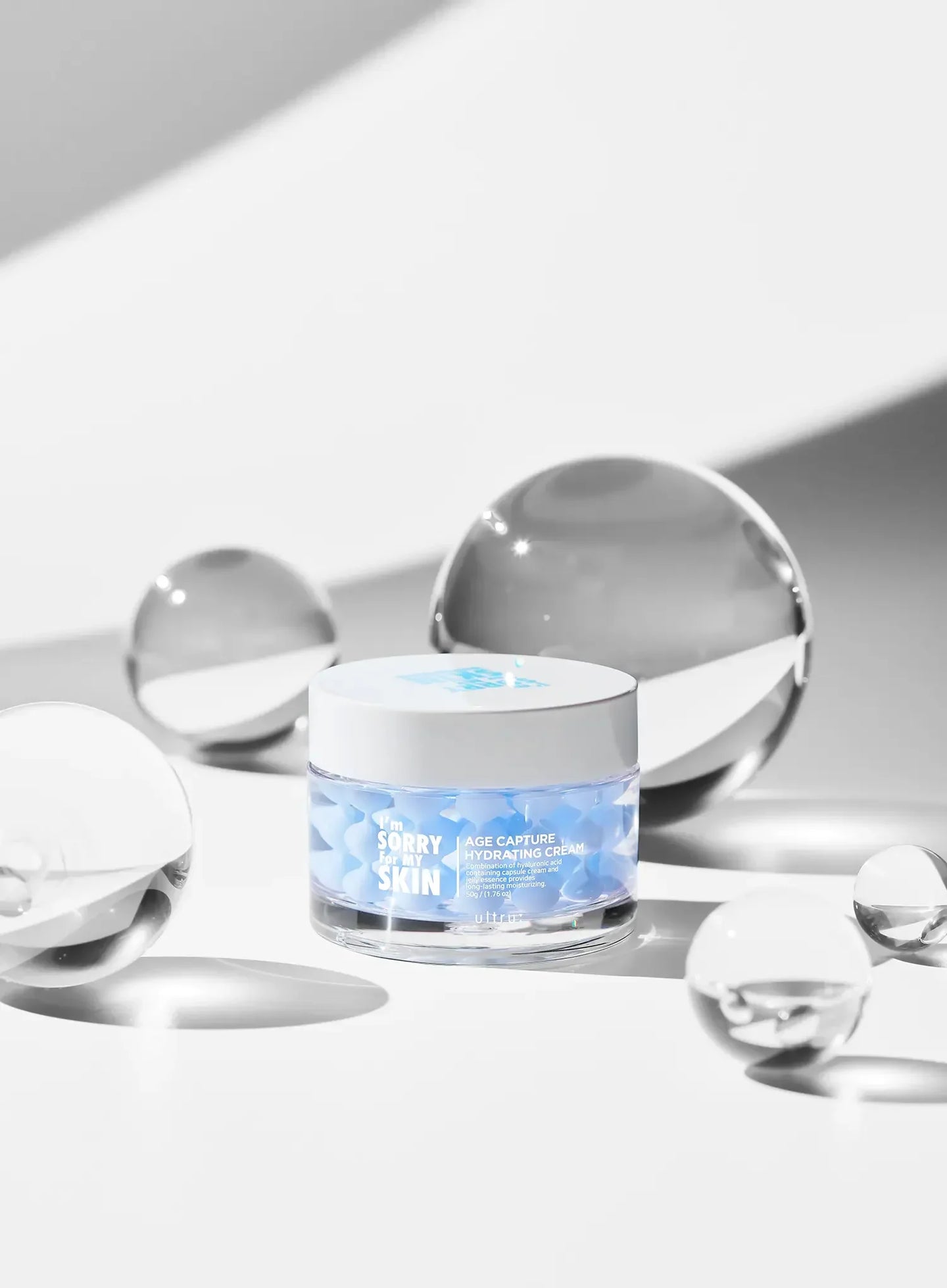 Scooping capture hydrating cream from jar for K-beauty moisture-lock routine