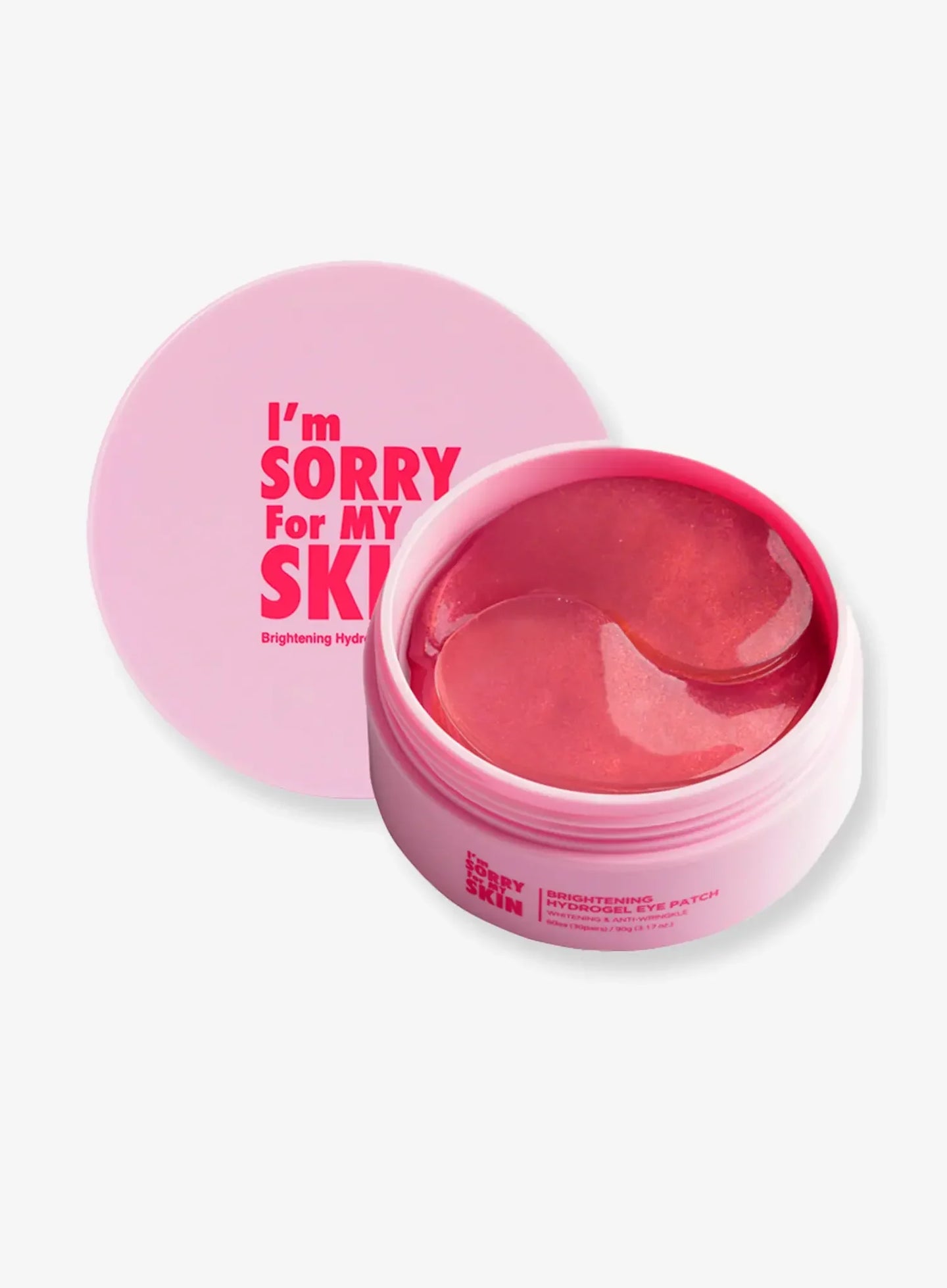 Placing brightening hydrogel eye patch under eye for K-beauty depuff and dark circle routine