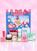 A Baerry Advent Calendar beauty gift set arranged in front of its decorated blue and pink box on a soft pink reflective surface. The set includes skincare products such as a tube of glutathione serum, a pink toner, a green serum bottle, purifying cream tubes, false eyelashes, a lip gloss, and two double-ended blush/cheek products.