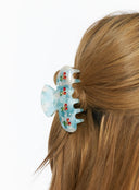 Azure Berry Blue Hair Pin IL529 blue marble resin claw clip worn in model's half-up hairstyle showing cherry rhinestone and crystal detail on side