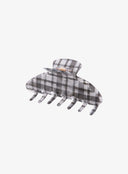 Black Check Hair Pin IL530 black and white plaid angled side view showing open clip mechanism with gold spring hinge and claw teeth detail