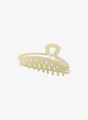 Green Hair Pin IL530 green side view flat lay revealing full length of claw teeth and slim profile with visible spring detail