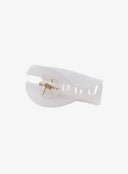 Half Moon Hair Pin IL530 White bottom close-up showing open clip jaw, gold coil spring pivot, and inner claw structure