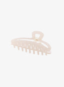 Light Beige Hair Pin IL530 light beige three-quarter view flat lay showcasing elongated oval silhouette evenly spaced teeth and loop handle
