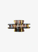 Marin Stripe Hair Pin IL529 brown blue yellow striped acetate claw clip top-down view revealing inner spring hinge hardware detail