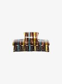 Marin Stripe Hair Pin IL529 brown blue yellow striped acetate claw clip front-facing view showing open jaw teeth and spring mechanism