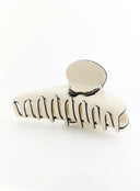Olive Hair Clip IL503 cream bottom-angle detail shot revealing open comb teeth structure and black edge trim
